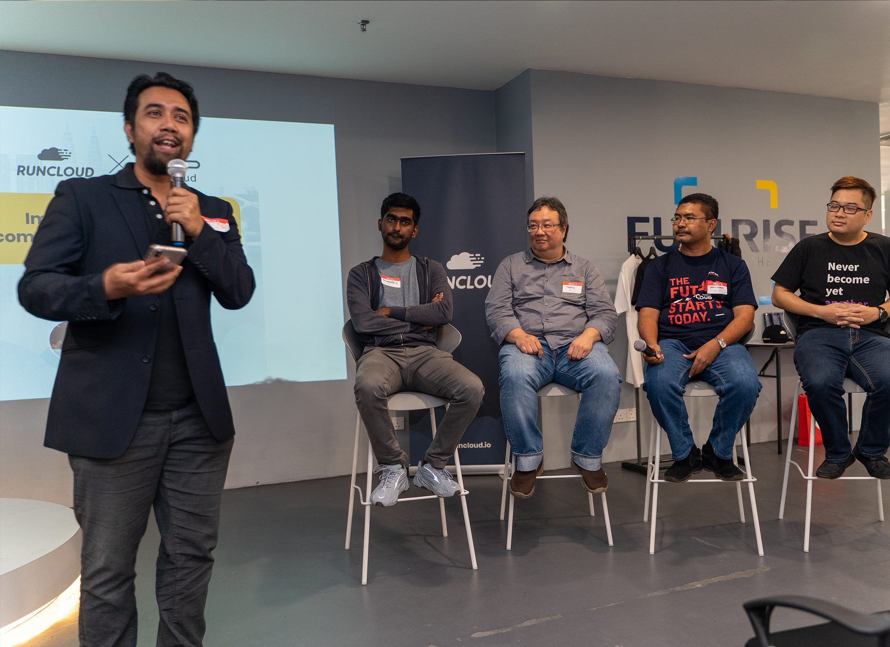 A moderated panel discussion at a past DevHub Malaysia event